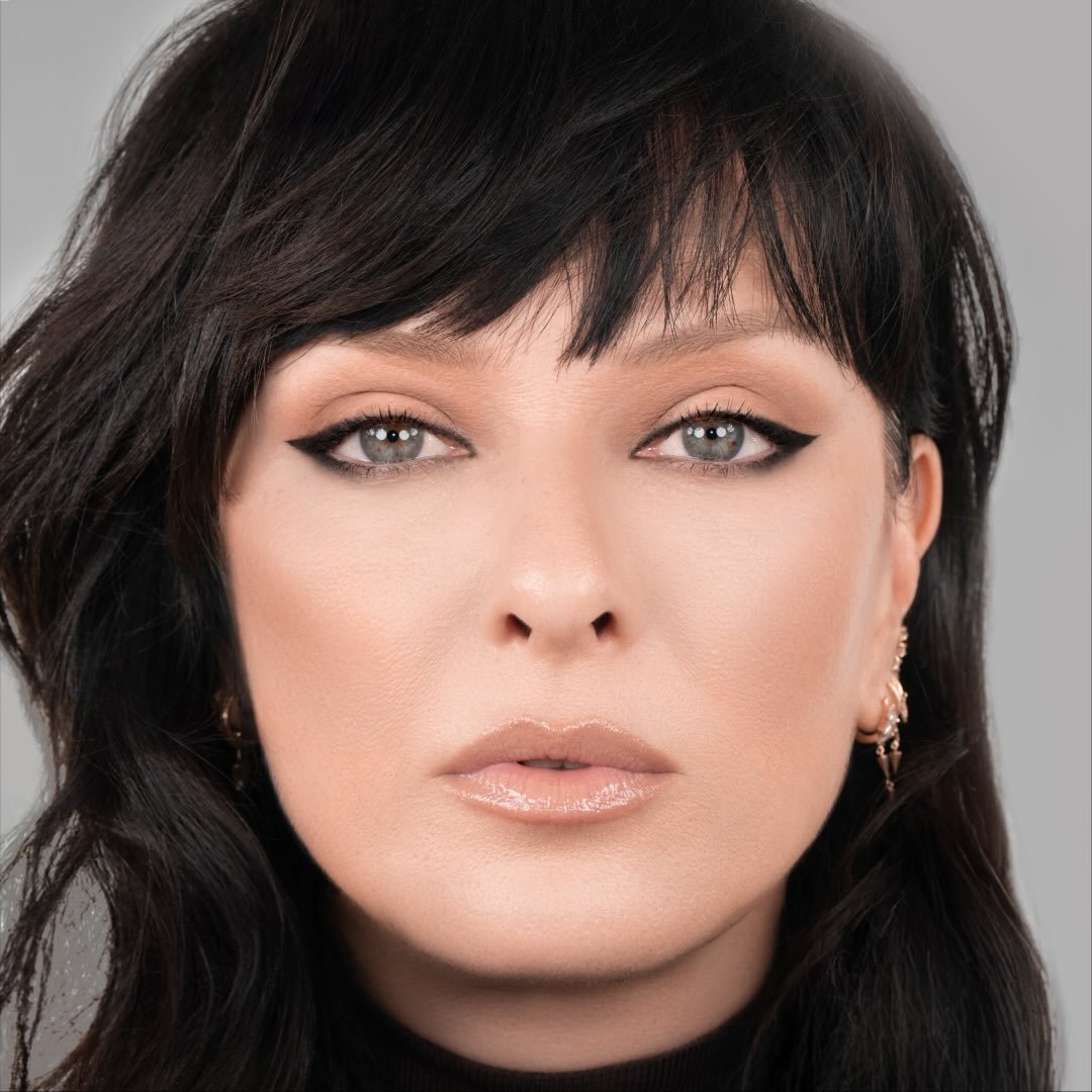 NATASHA DENONA logo