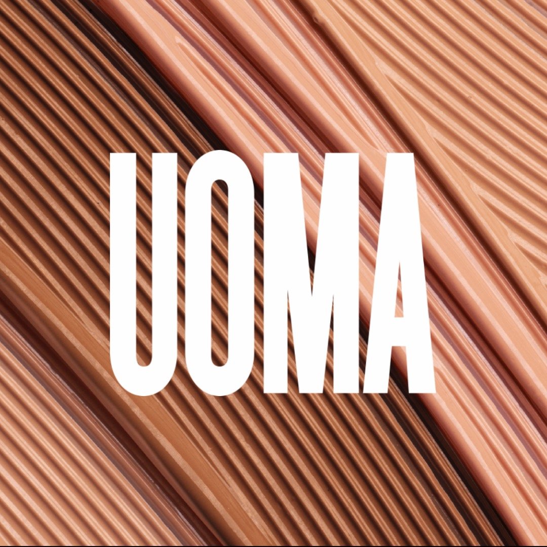 UOMA Beauty logo
